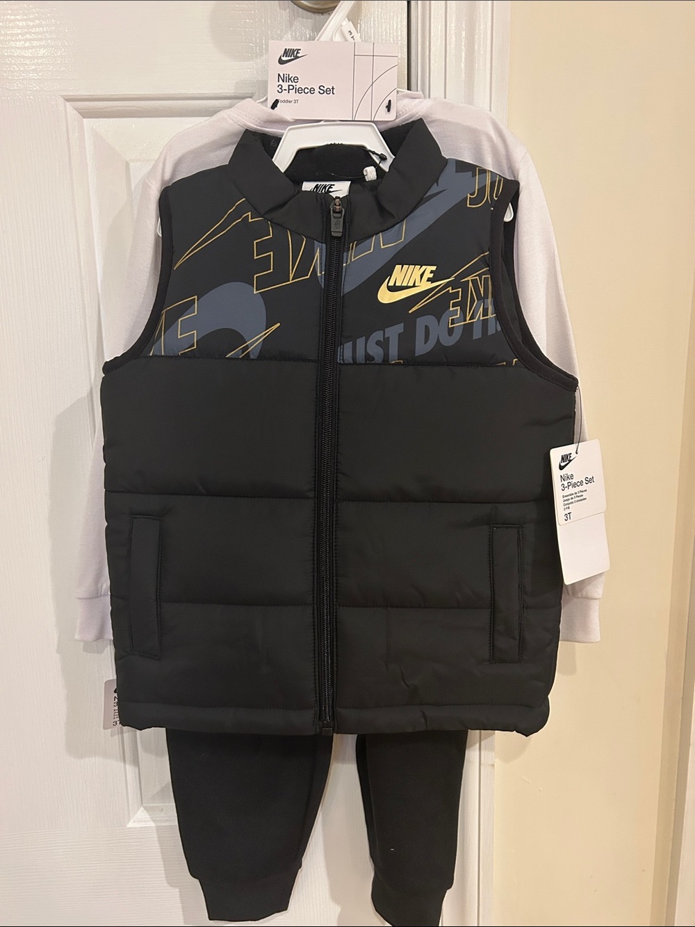 Nike Kids Black Vest with Yellow Logo Accents